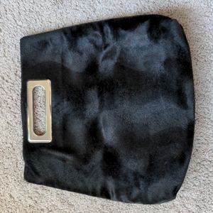 Black faux fur clutch.